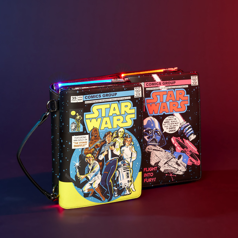 Image of two of our Stitch Shoppe Dark Side vs. Light Side Comic Book Crossbody Bags, sitting side by side showing off the opposite sides of the bag.
